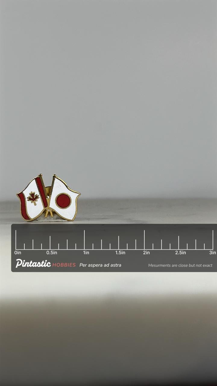Canada Japan Flag Pin: Red & White Enamel - International Friendship Accessory with ruler overlay for size reference