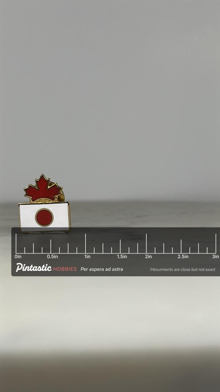 Canada Japan Flag Pin: Red & White Enamel Finish - International Accessory with ruler overlay for size reference