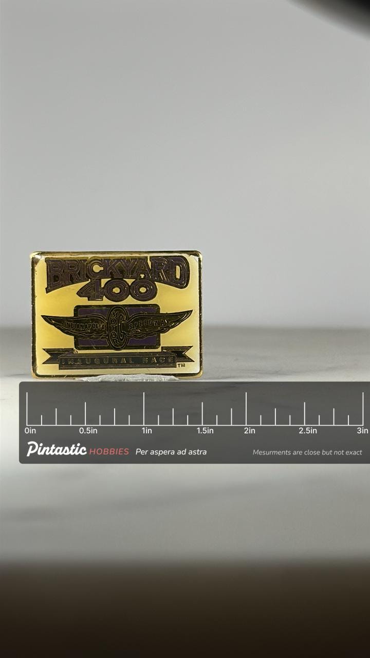 Brickyard 400 Enamel Pin: Gold Black Finish - Racing Inaugural Accessory with ruler overlay for size reference