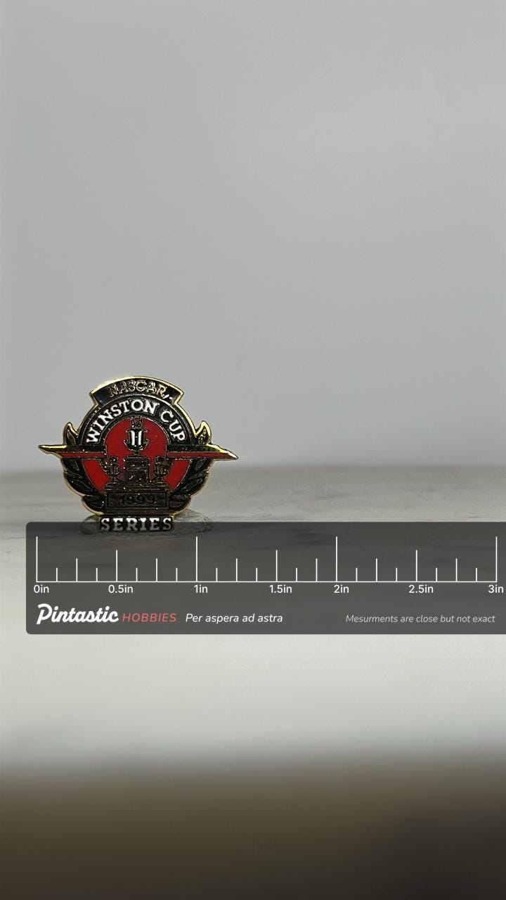 NASCAR Winston Cup Series Pin: Red Black Gold Enamel - 1999 Racing Accessory with ruler overlay for size reference