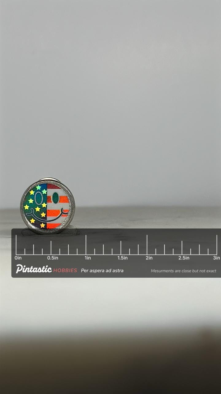 American Flag Smiley Face Pin: Holographic Enamel - Retro Patriotic Accessory with ruler overlay for size reference