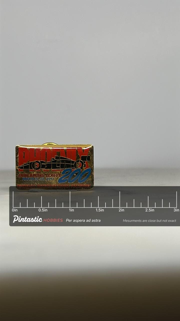 Phoenix 200 Racing Pin: Gold Tone Enamel - 1997 IRL Event Accessory with ruler overlay for size reference