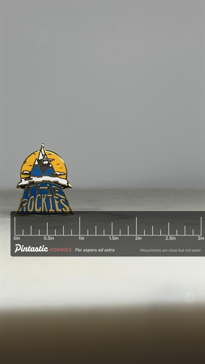 The Rockies Souvenir Pin: Blue & Gold Enamel - Vintage Travel Accessory with ruler overlay for size reference