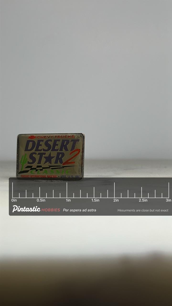 Desert Star 2 Racing Pin: Bold Colors & Chrome Finish - 1997 Event Accessory with ruler overlay for size reference