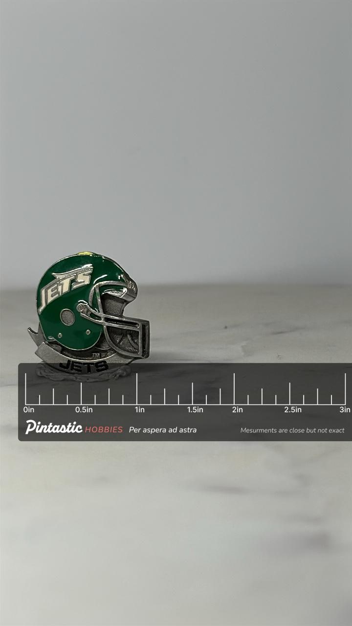 New York Jets Helmet Pin: Green Silver Enamel - Vintage Sports Accessory with ruler overlay for size reference
