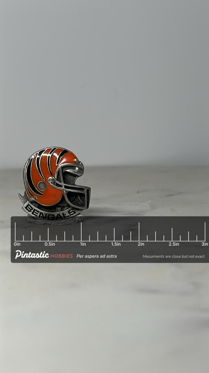 Bengals Helmet Pin: Orange Enamel Pewter - NFL Football Fan Accessory with ruler overlay for size reference