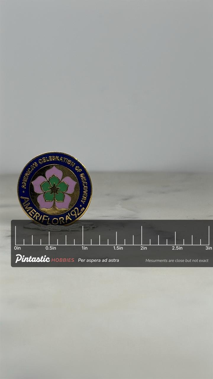 AmeriFlora '92 Pin: Gold Enamel Flower Emblem - 1990s Event Accessory with ruler overlay for size reference