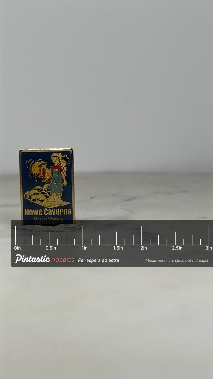Howe Caverns Souvenir Pin: Enamel Goldtone - Vintage Travel Accessory with ruler overlay for size reference