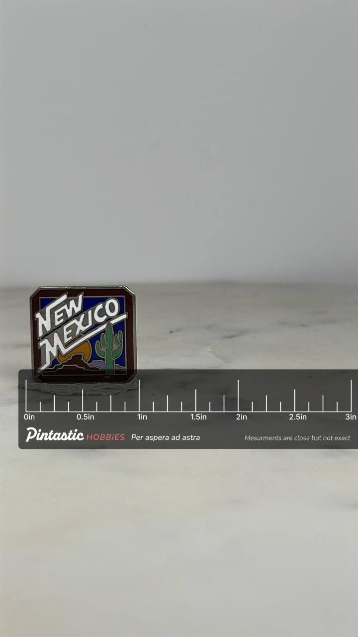 New Mexico Souvenir Pin: Enamel Desert Scene - Retro Travel Accessory with ruler overlay for size reference