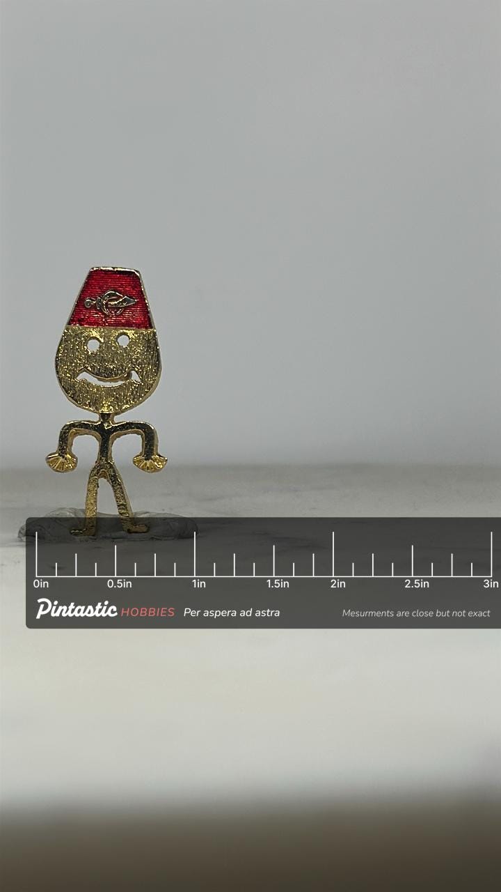 Shriners Figure Pin: Gold Tone with Red Fez - Fraternal Vintage Accessory with ruler overlay for size reference