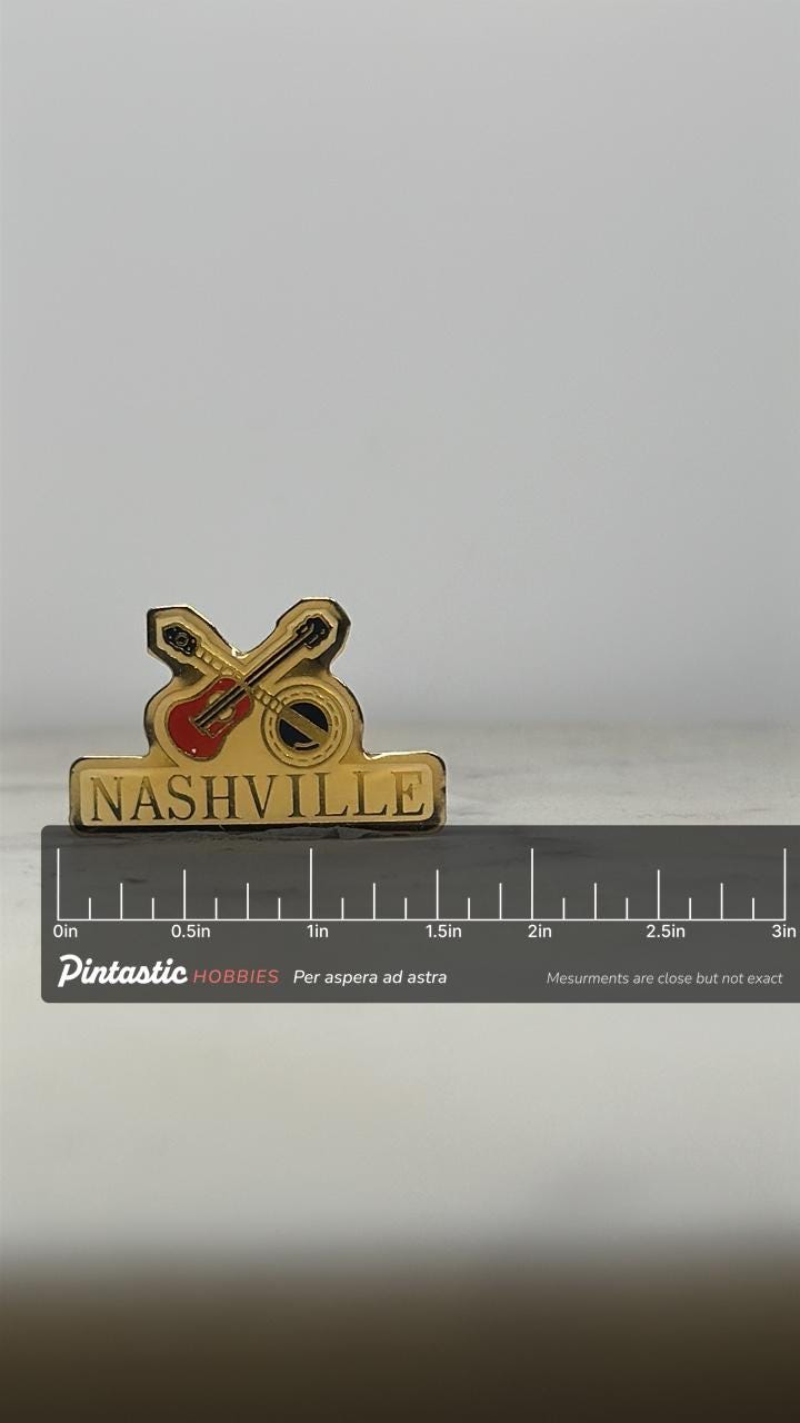 Nashville Music Souvenir Pin: Gold Enamel Finish - Vintage Travel Accessory with ruler overlay for size reference