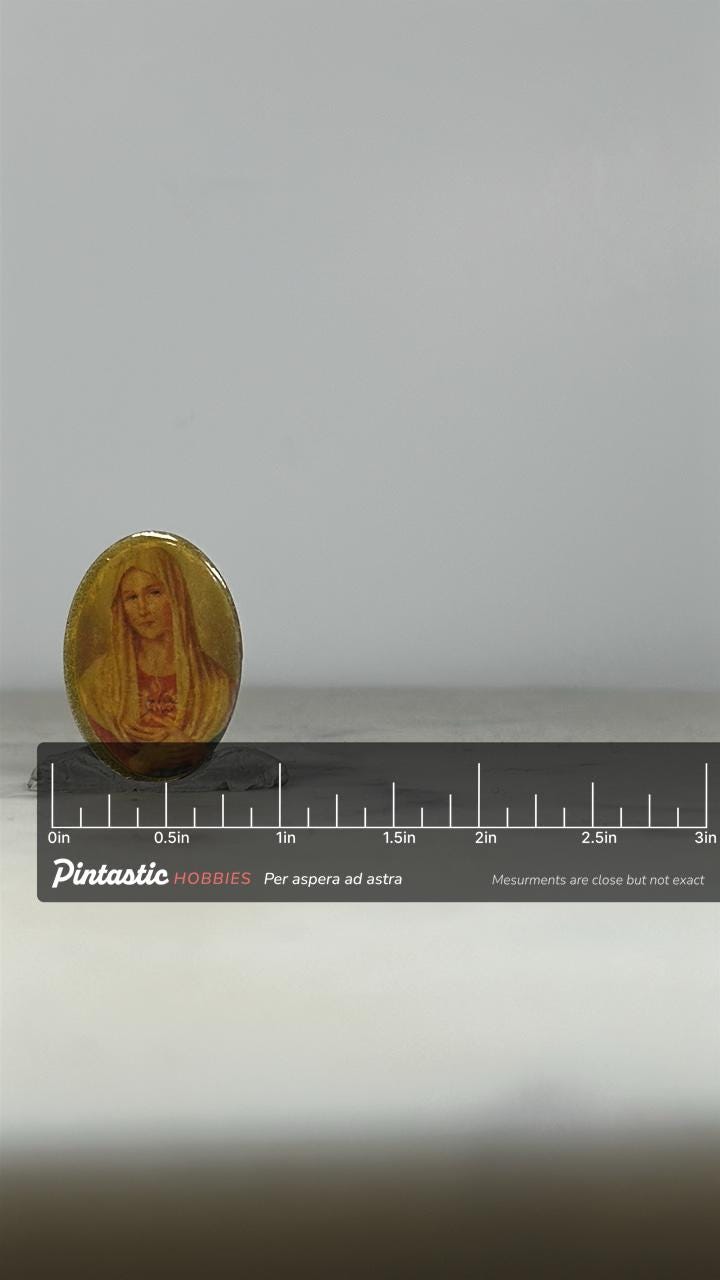 Virgin Mary Oval Pin: Vintage Resin Religious - Catholic Icon Accessory with ruler overlay for size reference