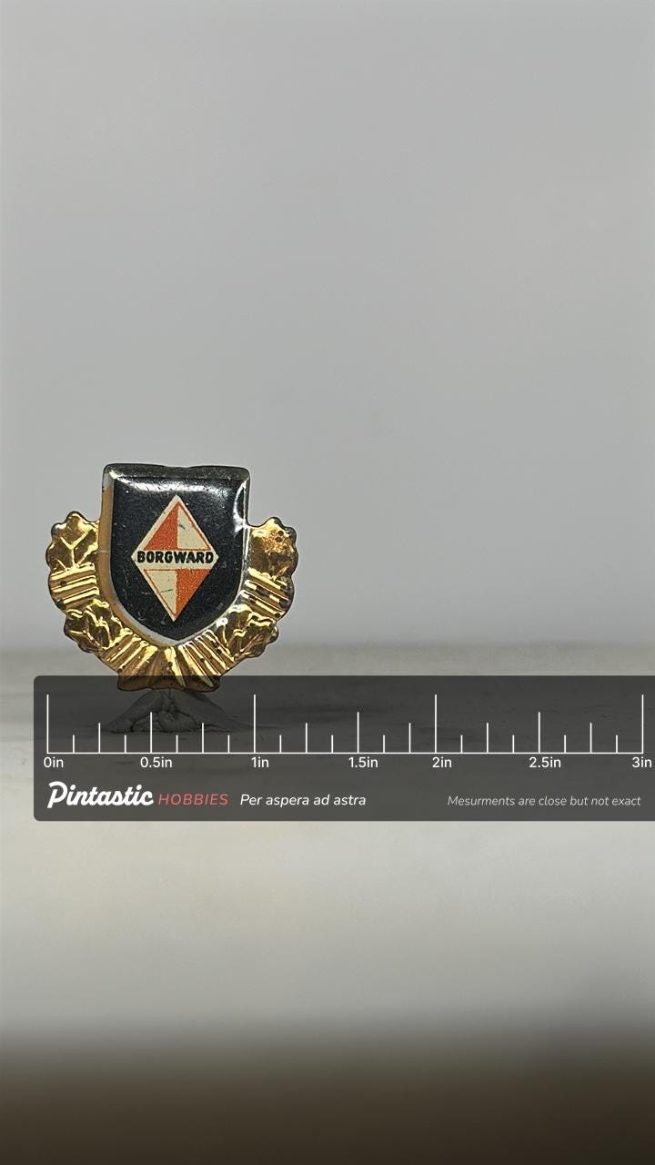 Borgward Car Emblem Pin: Gold Trim Enamel - Vintage Auto Accessory with ruler overlay for size reference