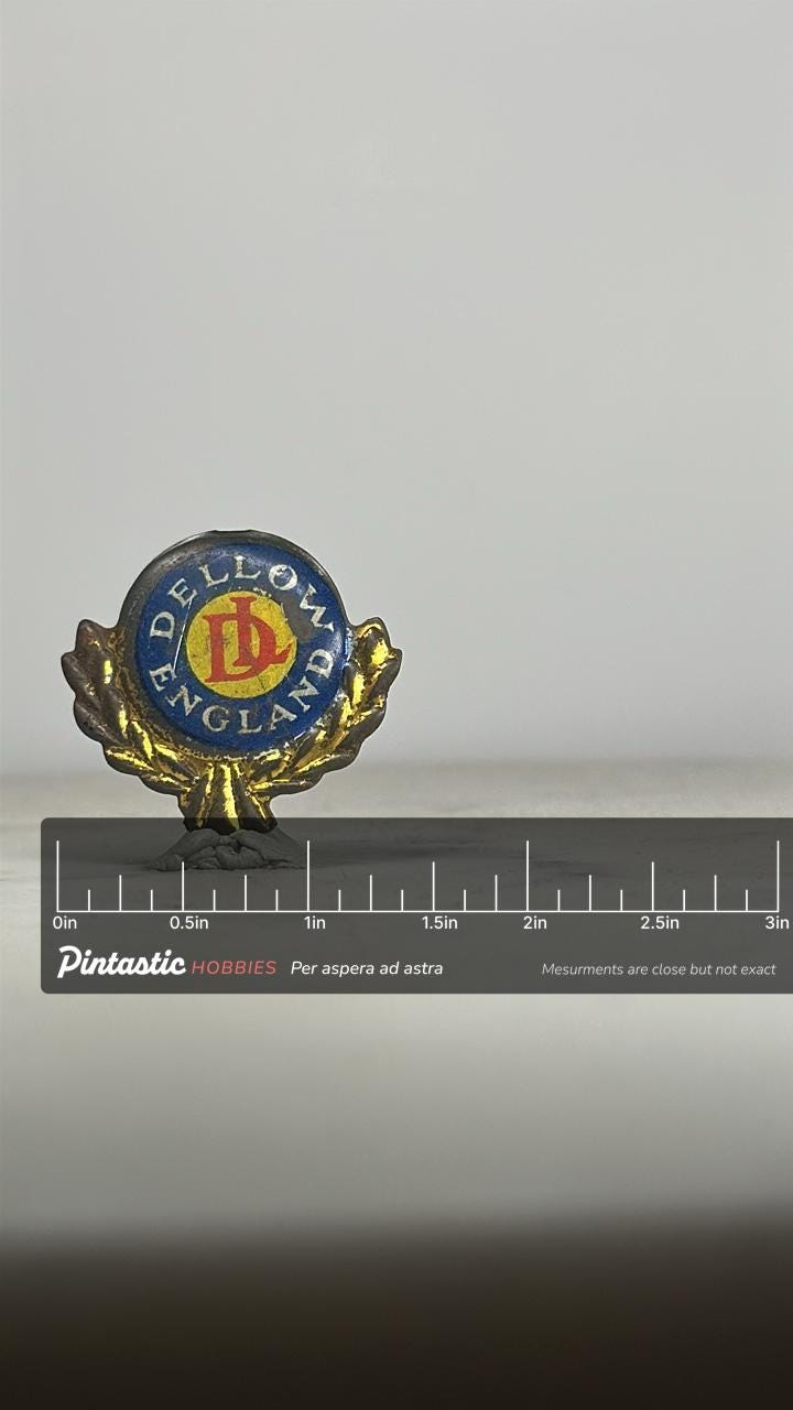 Dellow England Enamel Pin: Blue & Gold Laurel - Vintage Auto Accessory with ruler overlay for size reference