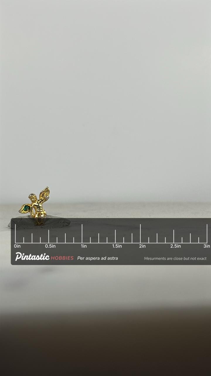 Angel Cherub Pin: Gold Tone with Green Gem - Vintage Religious Accessory with ruler overlay for size reference