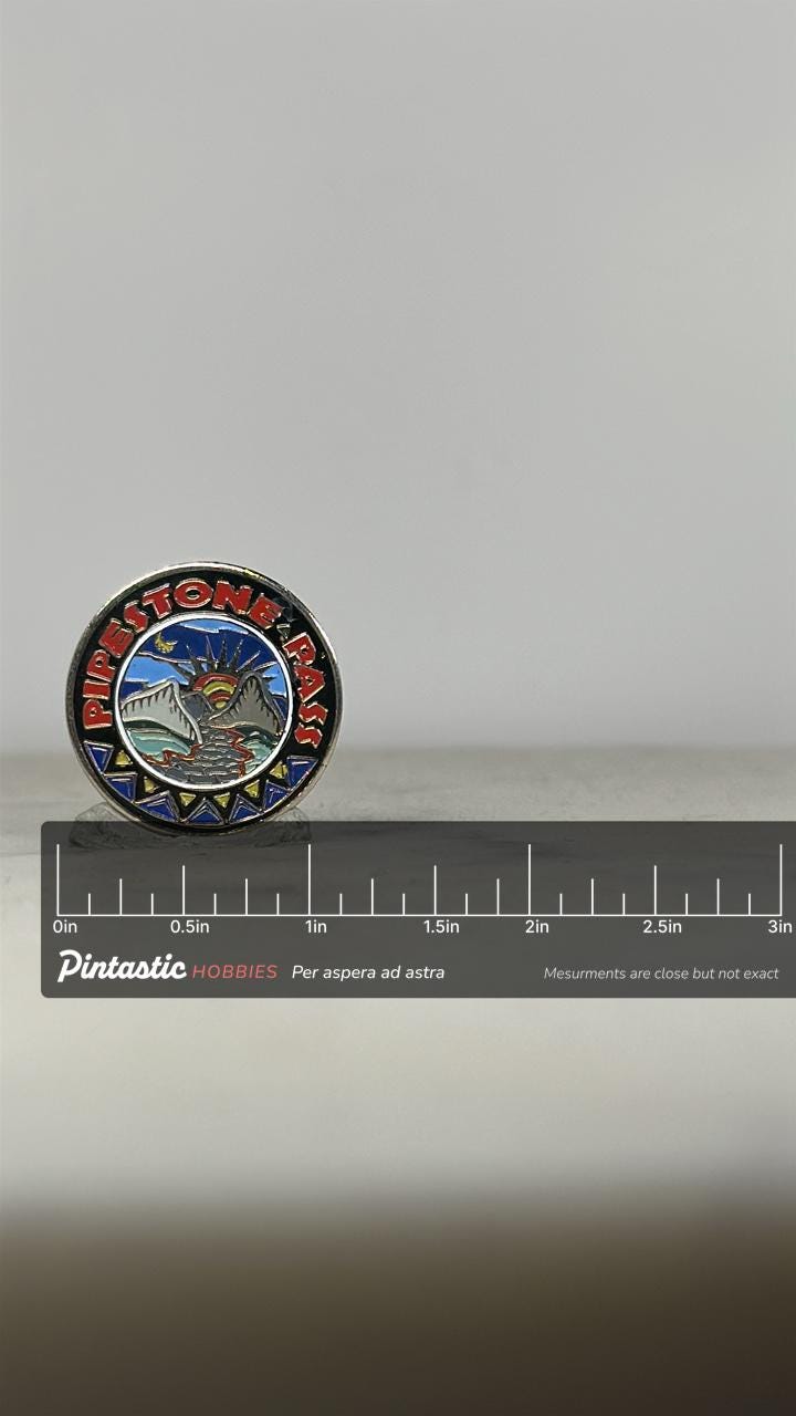 Pipestone Pass Enamel Pin: Colorful Scenic Design - Vintage Travel Accessory with ruler overlay for size reference