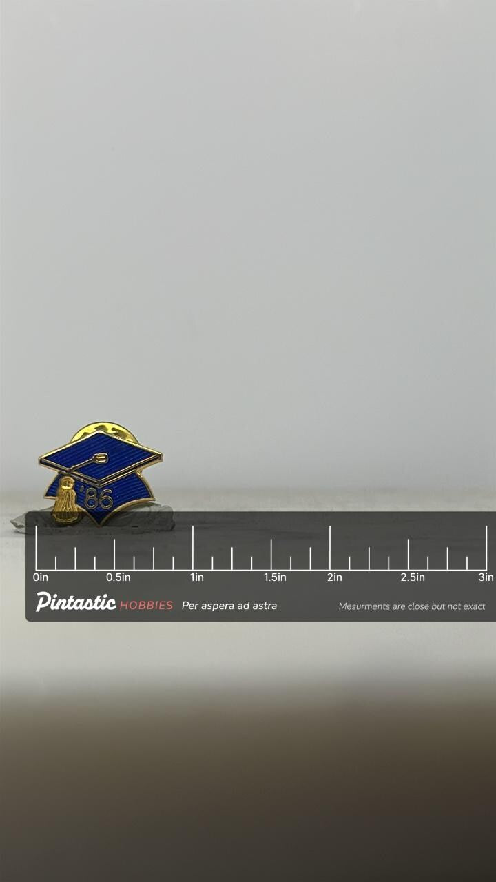 1986 Graduation Cap Pin: Blue Enamel Gold Trim - Vintage School Accessory with ruler overlay for size reference