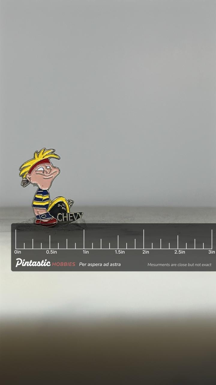Calvin Peeing Chevy Enamel Pin: Cartoon Style - 90s Satire Accessory with ruler overlay for size reference