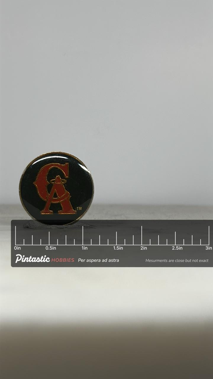 California Angels Baseball Pin: Red & Gold Enamel - Vintage Sports Accessory with ruler overlay for size reference