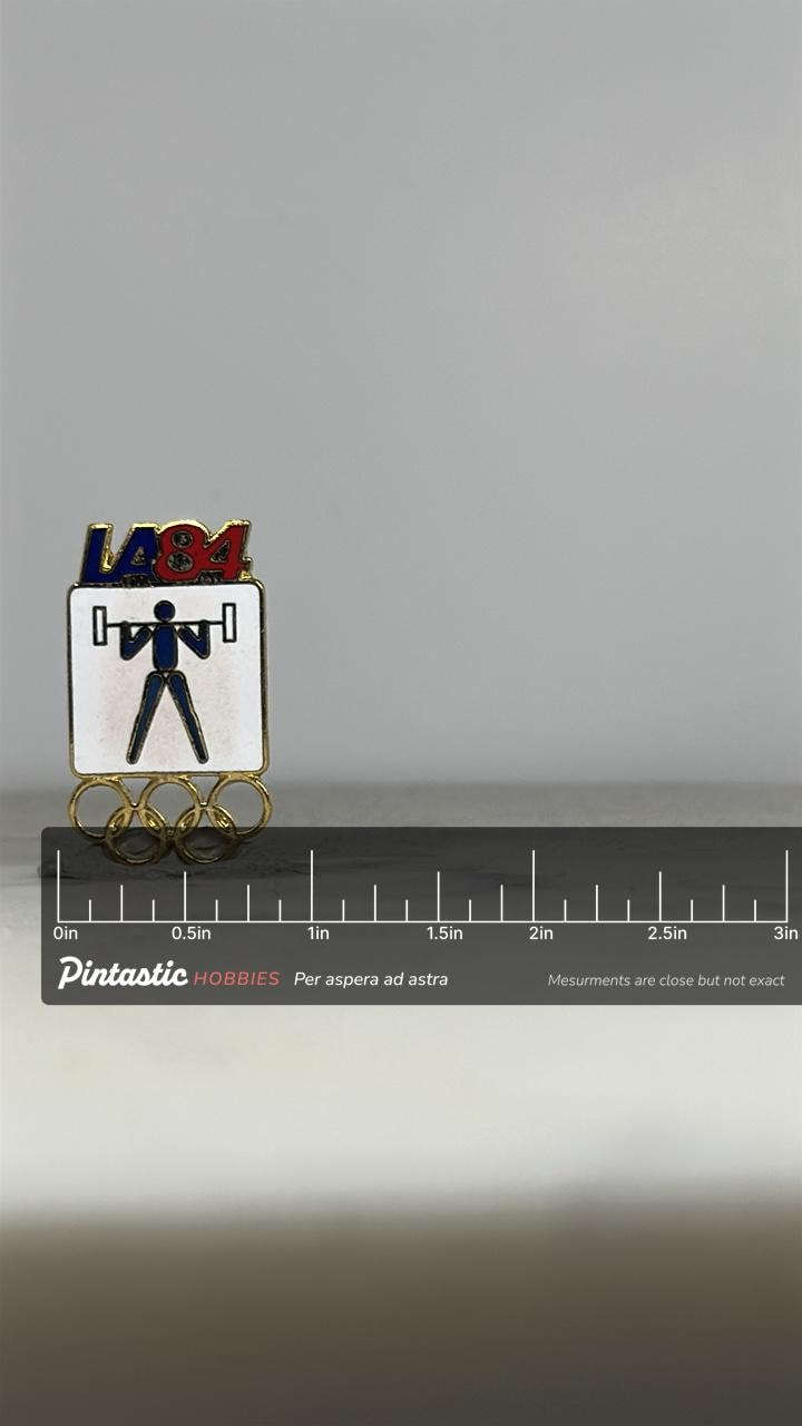 LA84 Olympic Weightlifting Pin: Enamel & Gold Tone - 1984 Games Accessory with ruler overlay for size reference