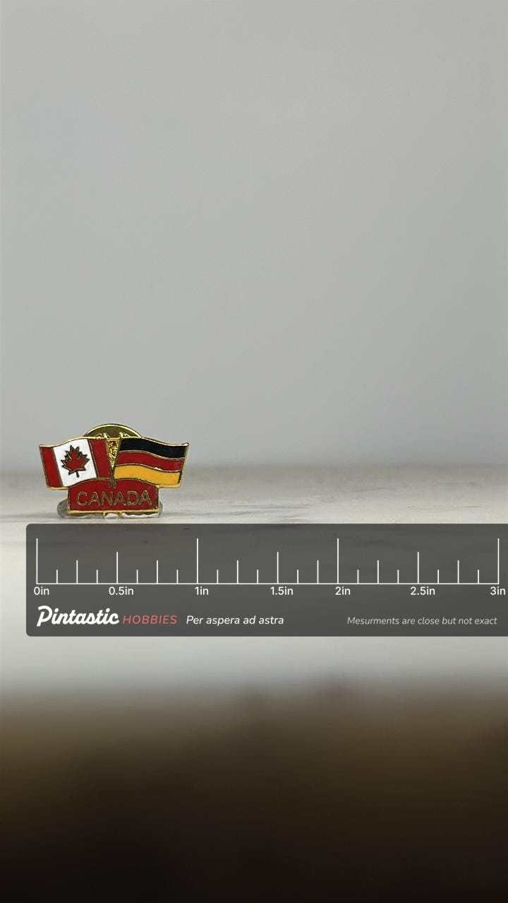 Canada Germany Flag Pin: Gold Tone Enamel - International Pride Accessory with ruler overlay for size reference