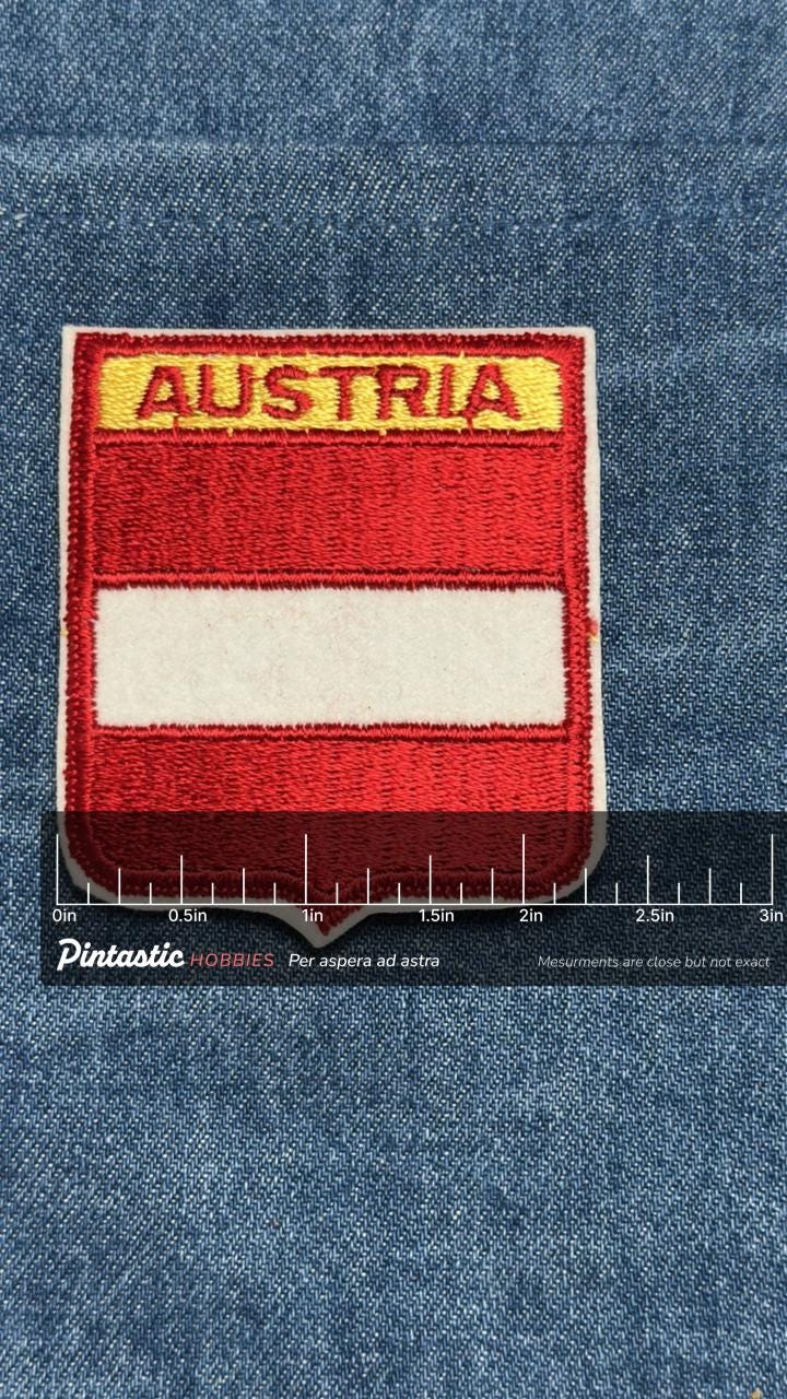 Austria Flag Iron On Patch: Red and White Embroidered - Vintage Travel Accessory with ruler overlay for size reference