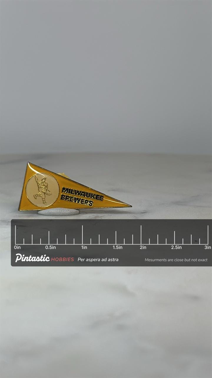 Milwaukee Brewers Pennant Pin: Yellow Enamel - Vintage Sports Accessory with ruler overlay for size reference