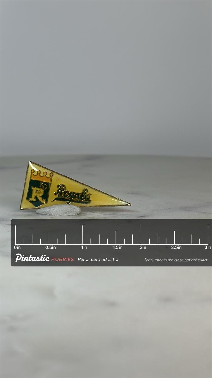 KC Royals Pennant Pin: Yellow & Green Enamel - Vintage Sports Accessory with ruler overlay for size reference