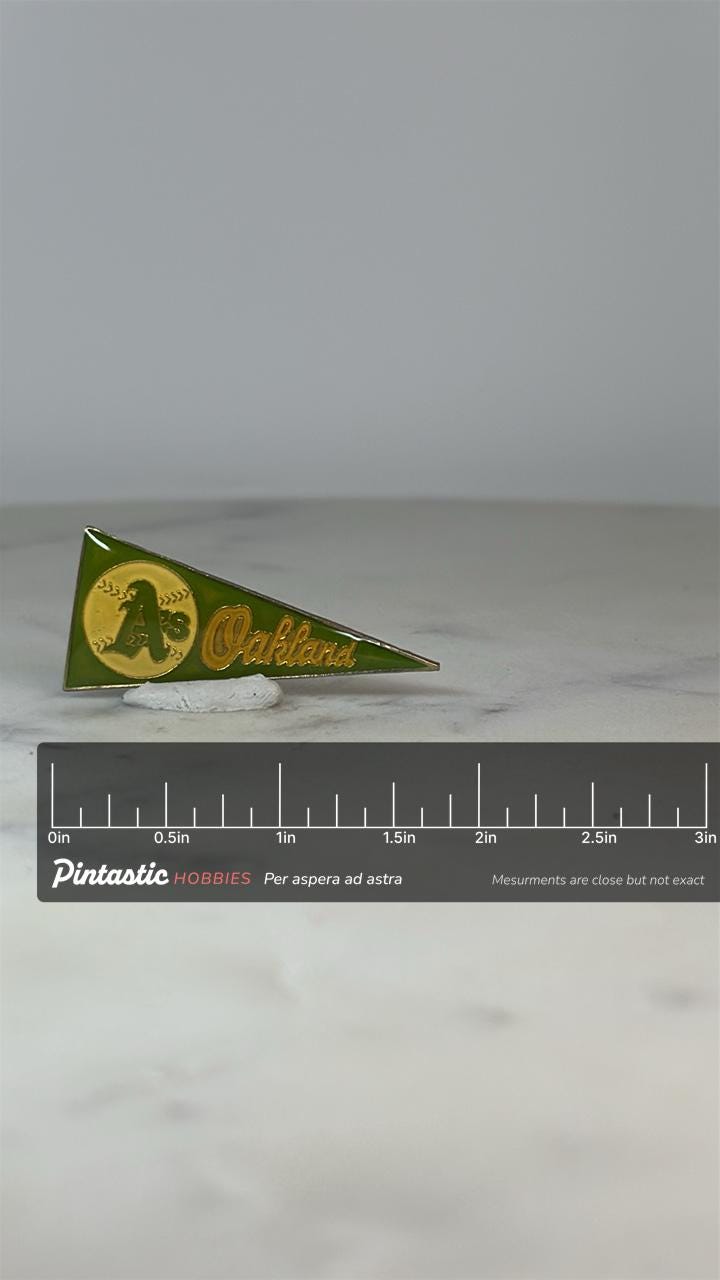Oakland A's Pennant Pin: Green Yellow Enamel - Vintage Sports Accessory with ruler overlay for size reference