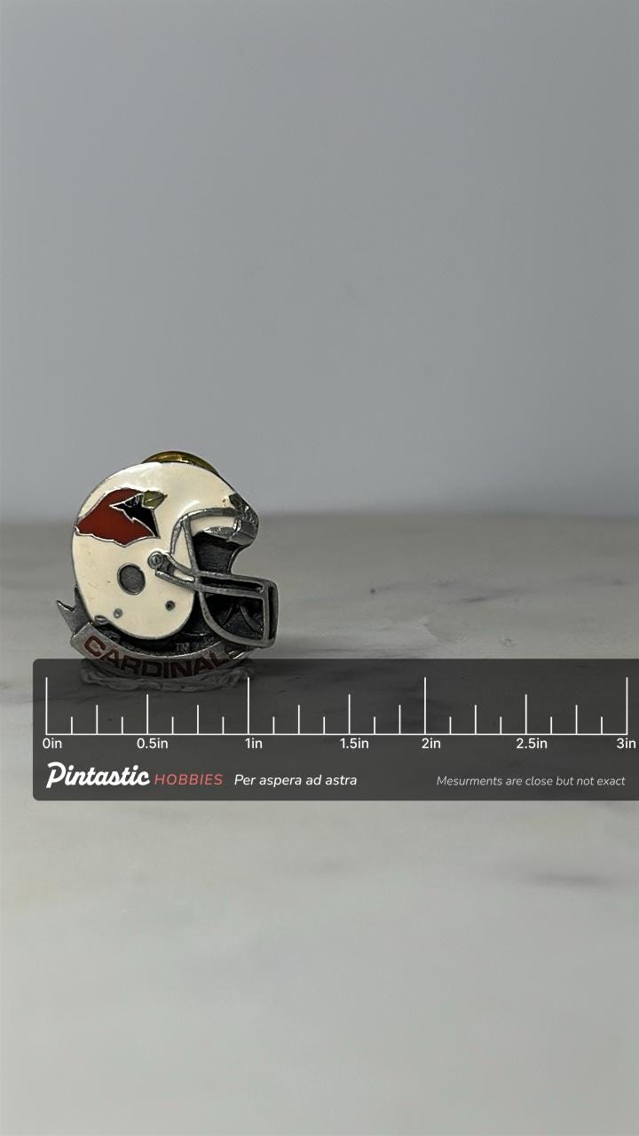 Arizona Cardinals Helmet Pin: Silver Enamel - Vintage NFL Accessory with ruler overlay for size reference