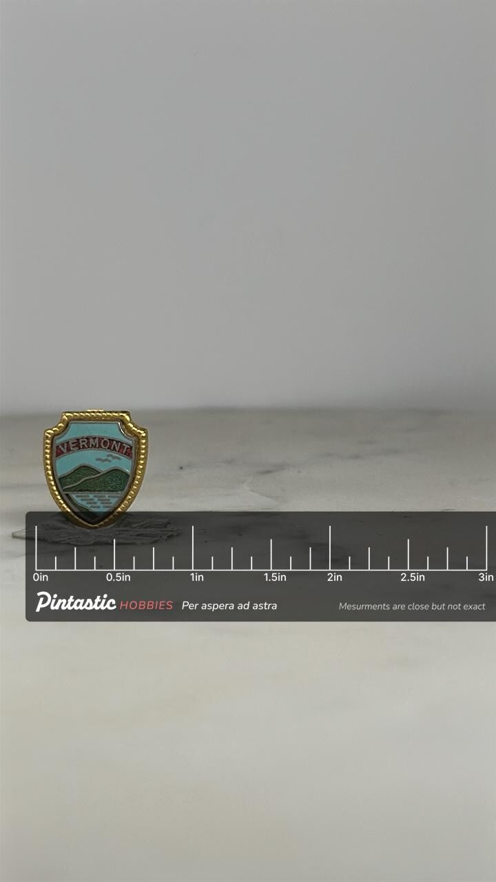 Vermont Travel Pin: Enamel Shield Goldtone - Vintage Souvenir Accessory with ruler overlay for size reference