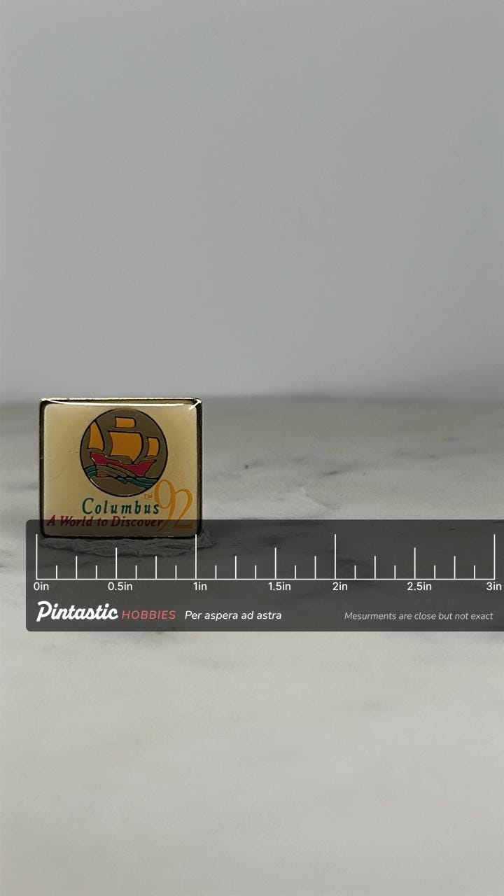 Columbus 92 Commemorative Pin: Gold-Tone Enamel - Historical Travel Accessory with ruler overlay for size reference