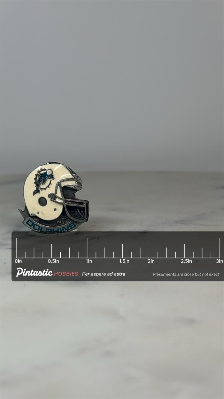Miami Dolphins Helmet Pin: White Enamel & Pewter - Vintage NFL Accessory with ruler overlay for size reference