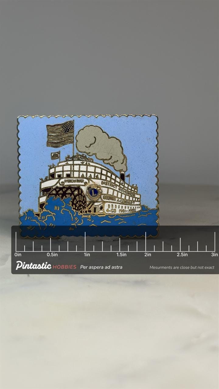 Riverboat Lions Club Pin: Blue & Gold Enamel - 1980s Organization Accessory with ruler overlay for size reference
