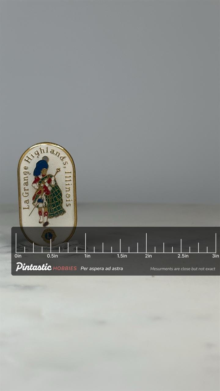 LaGrange Highlands Illinois Pin: Enamel & Gold Tone - Lions Club Collectible with ruler overlay for size reference