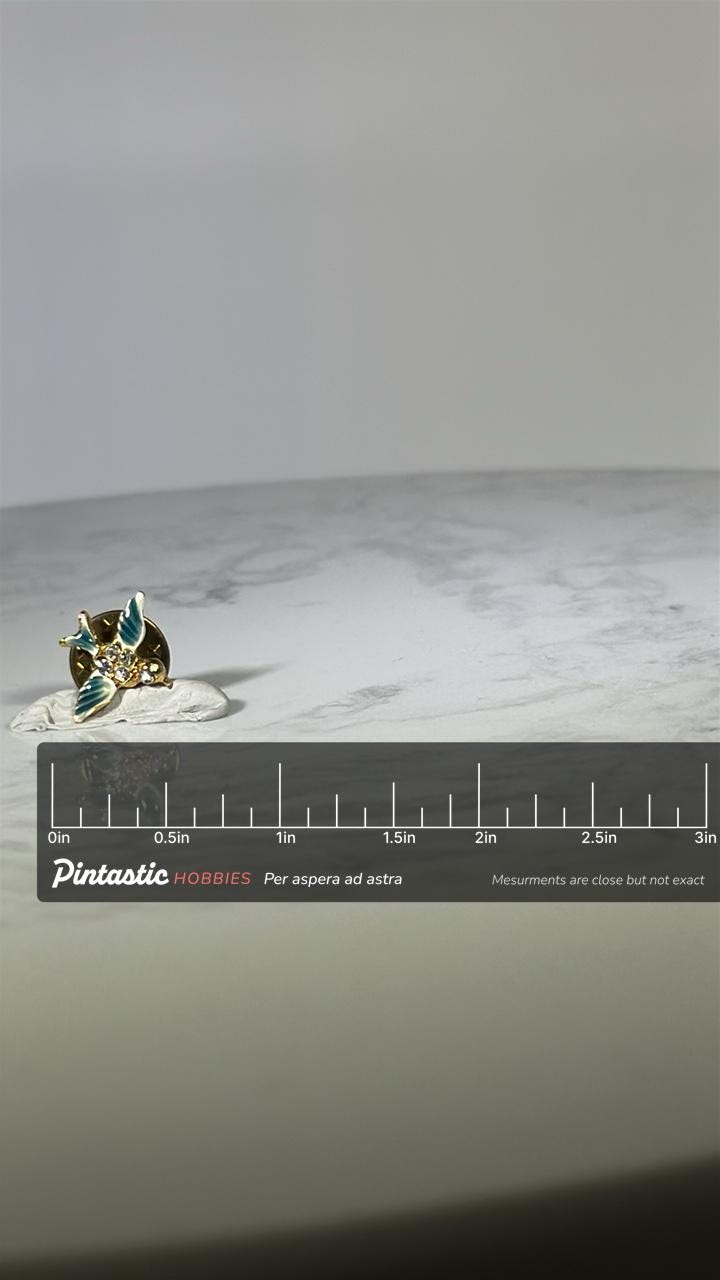 Enamel Bluebird Pin: Gold & Rhinestone Finish - Vintage Nature Accessory with ruler overlay for size reference
