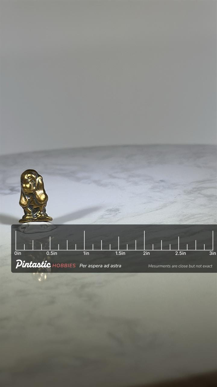 Basset Hound Dog Lapel Pin: Brass Finish - Mid-Century Animal Accessory with ruler overlay for size reference