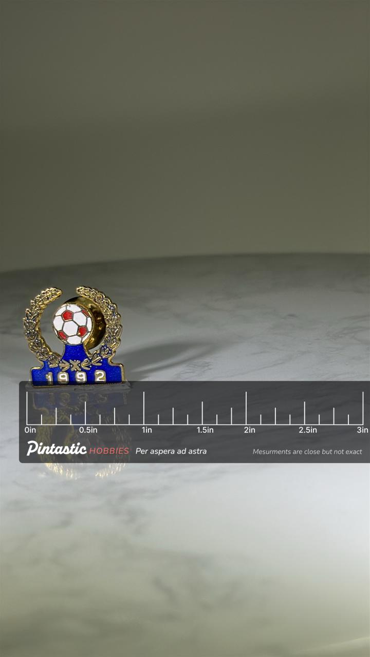 Soccer Champion Pin: Gold Enamel Finish - 1992 Sports Accessory with ruler overlay for size reference