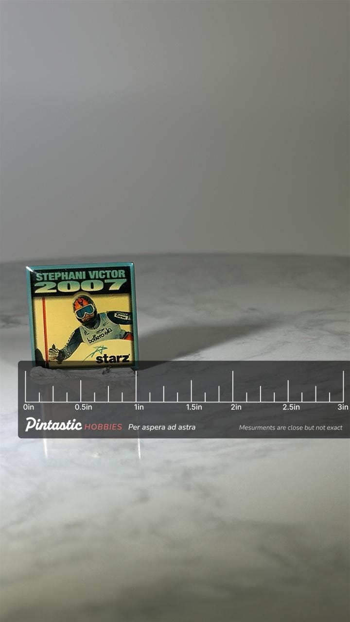 Stephani Victor Skiing Pin: Starz Promo Collectible - 2007 Sports Accessory with ruler overlay for size reference
