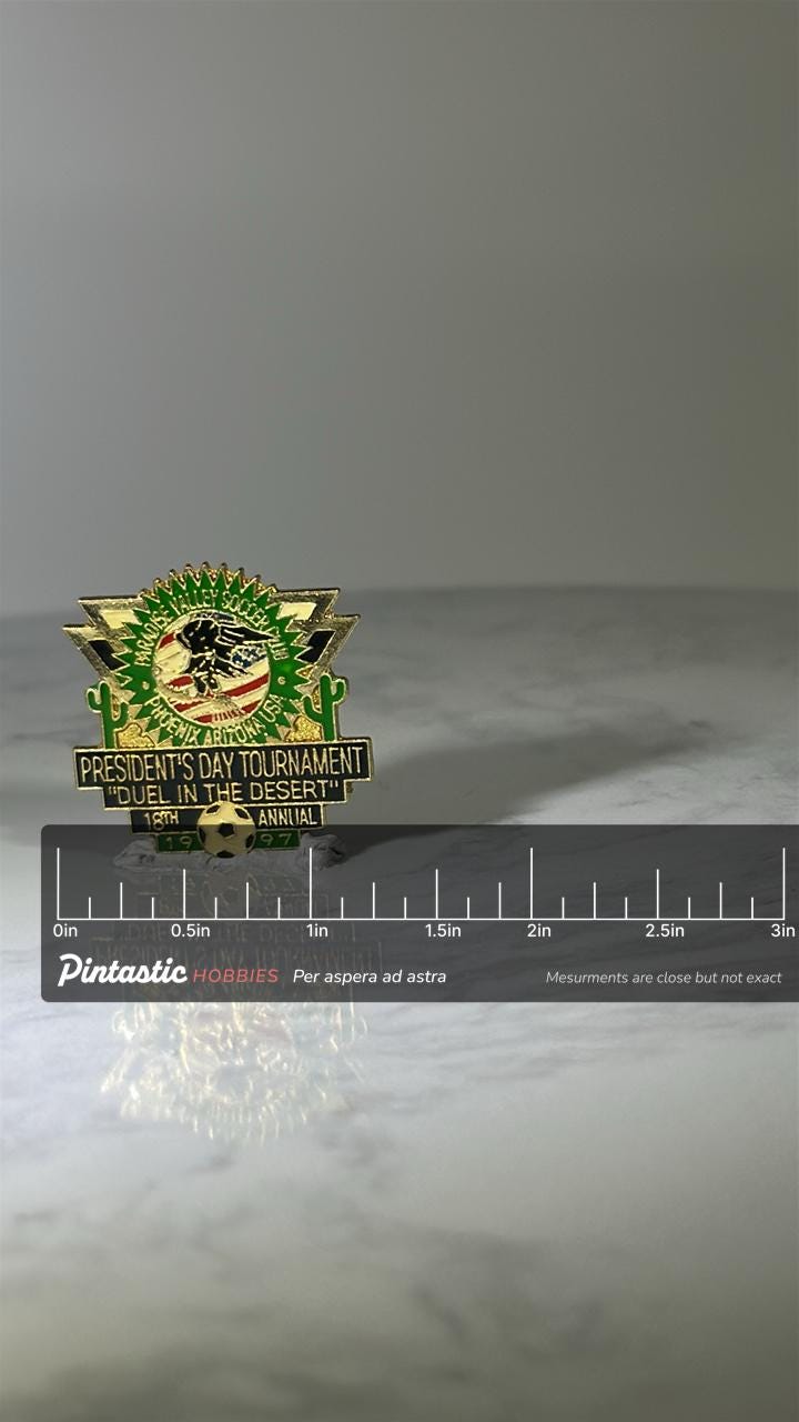 Duel in the Desert Soccer Pin: Gold Green Enamel - 1997 Sports Accessory with ruler overlay for size reference