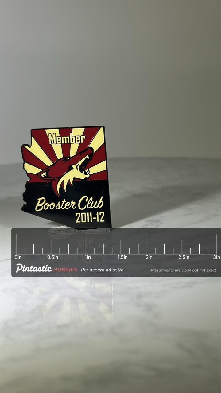 Arizona Coyotes Booster Club Pin: Red & Yellow Enamel - 2011-12 Sports Accessory with ruler overlay for size reference