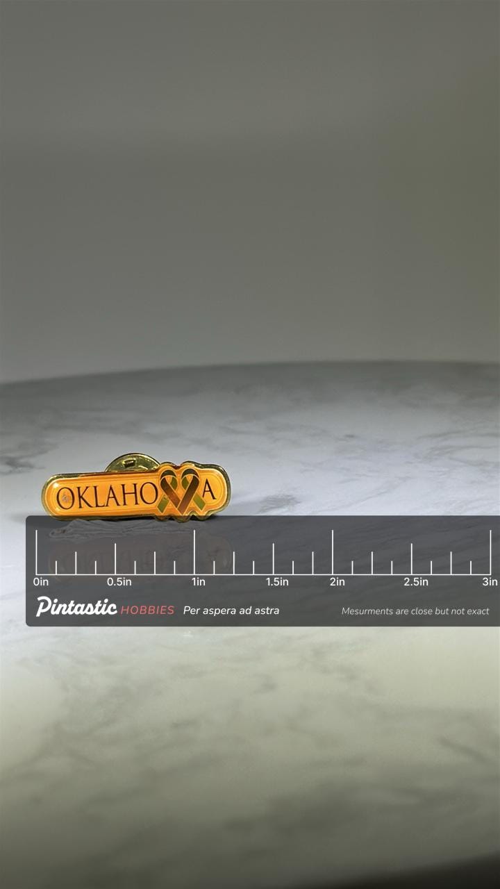Oklahoma Ribbon Pin: Yellow Enamel & Gold Tone - Awareness Accessory with ruler overlay for size reference