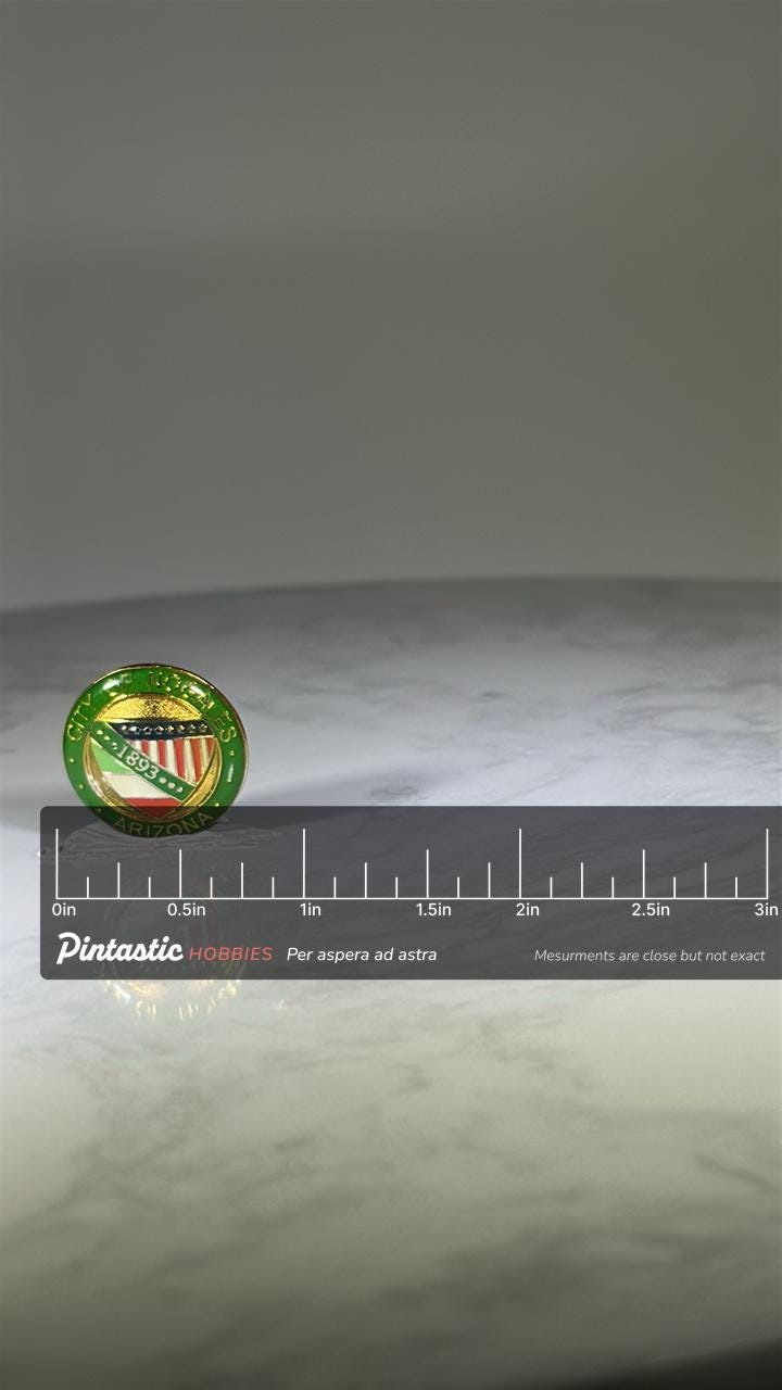 City of Nogales Arizona Pin: Gold & Enamel Crest - Vintage Civic Accessory with ruler overlay for size reference