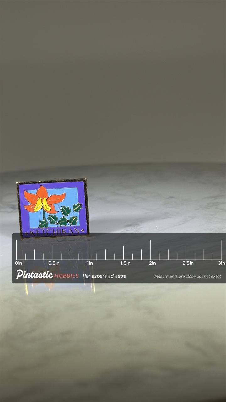 Ketchikan Alaska Flower Enamel Pin: Red & Yellow Columbine - Souvenir Travel Accessory with ruler overlay for size reference
