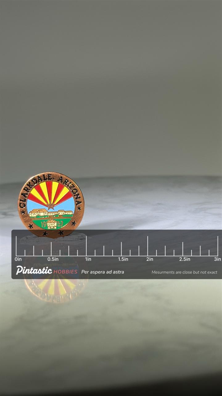Clarkdale Arizona Souvenir Pin: Enamel Bronze Finish - Vintage Travel Accessory with ruler overlay for size reference