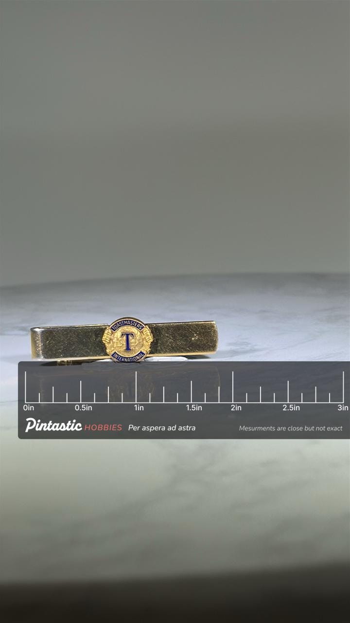 Toastmasters Tie Clip: Gold Tone Enamel - Vintage Career Accessory with ruler overlay for size reference