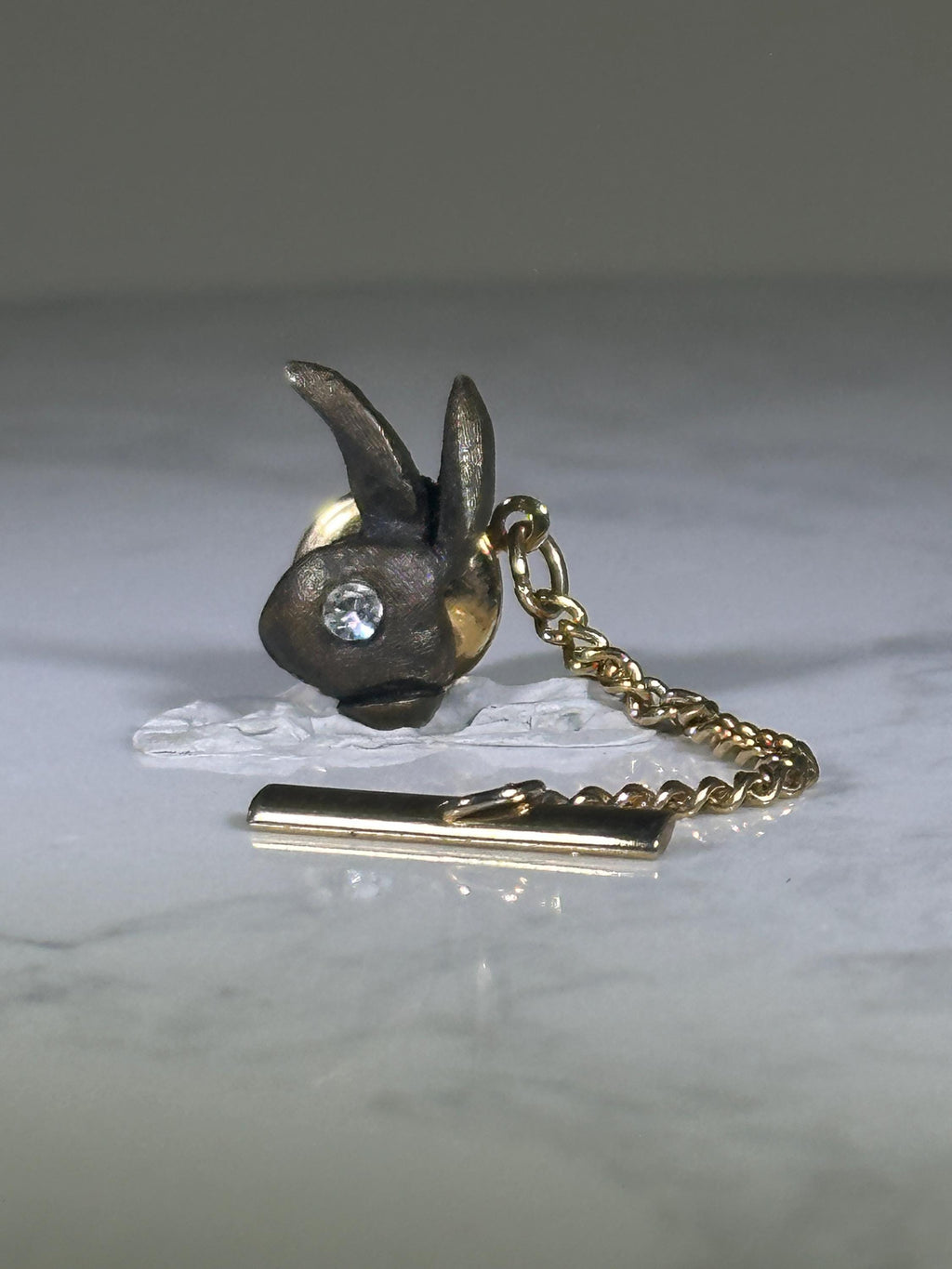 Playboy Bunny Tie Tack: Bronze Finish with Rhinestone Eye - Mid-Century Accessory