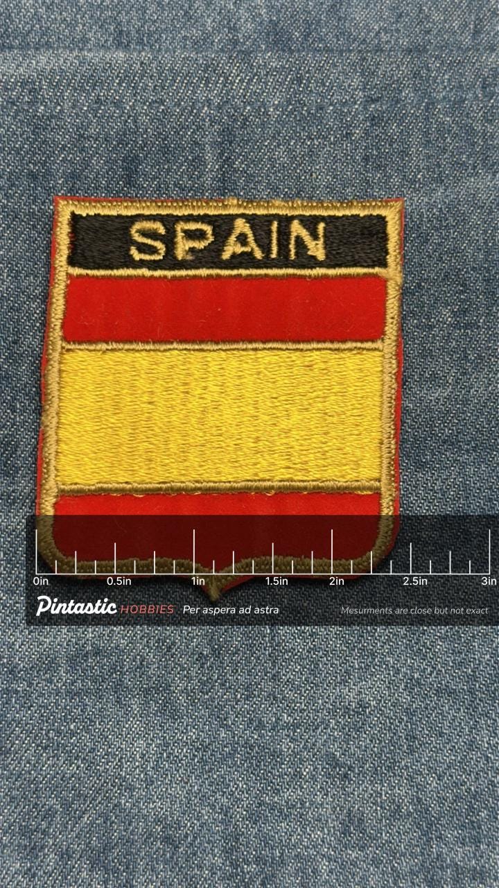Spain Flag Iron On Patch: Red Yellow Embroidered - Vintage Travel Accessory with ruler overlay for size reference