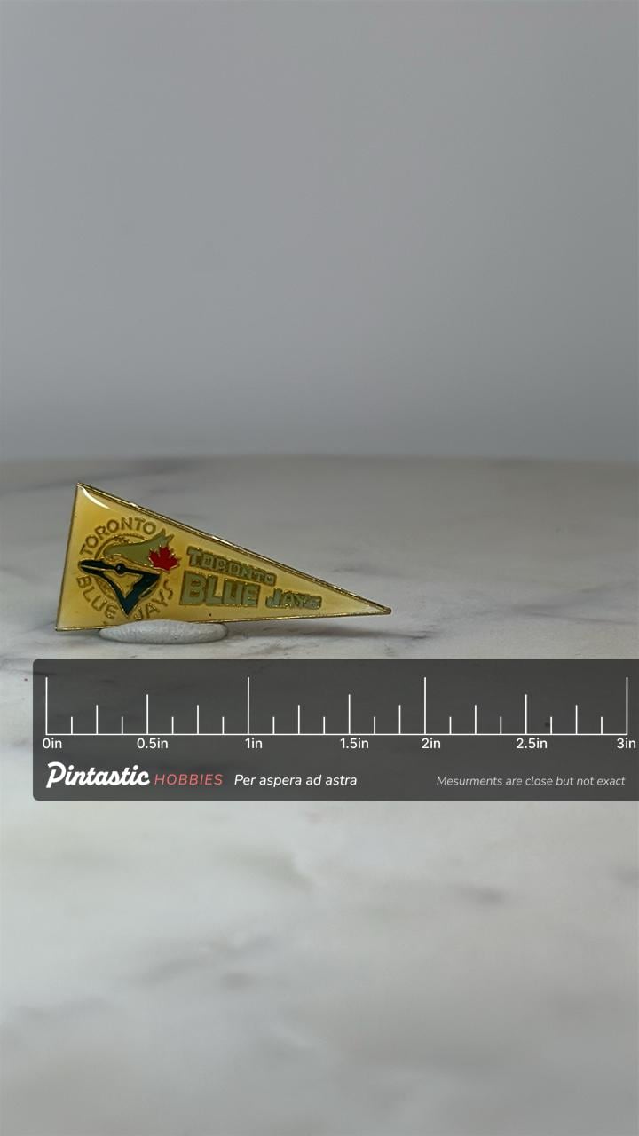 Toronto Blue Jays Pennant Pin: Yellow Enamel Finish - Vintage Sports Accessory with ruler overlay for size reference