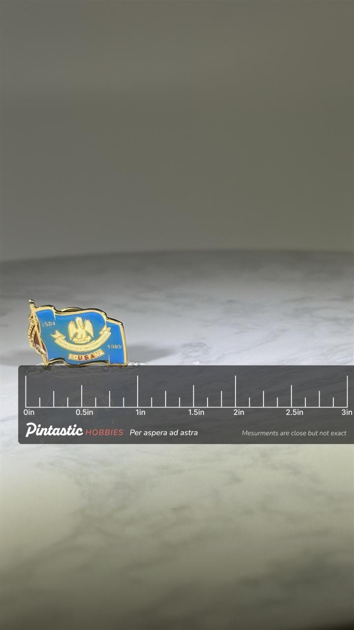 Louisiana State Flag Pin: Blue Enamel Gold Trim - 1980s Souvenir Accessory with ruler overlay for size reference